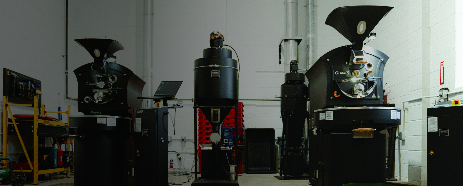 two specialty coffee roasters with a de-stoner in between