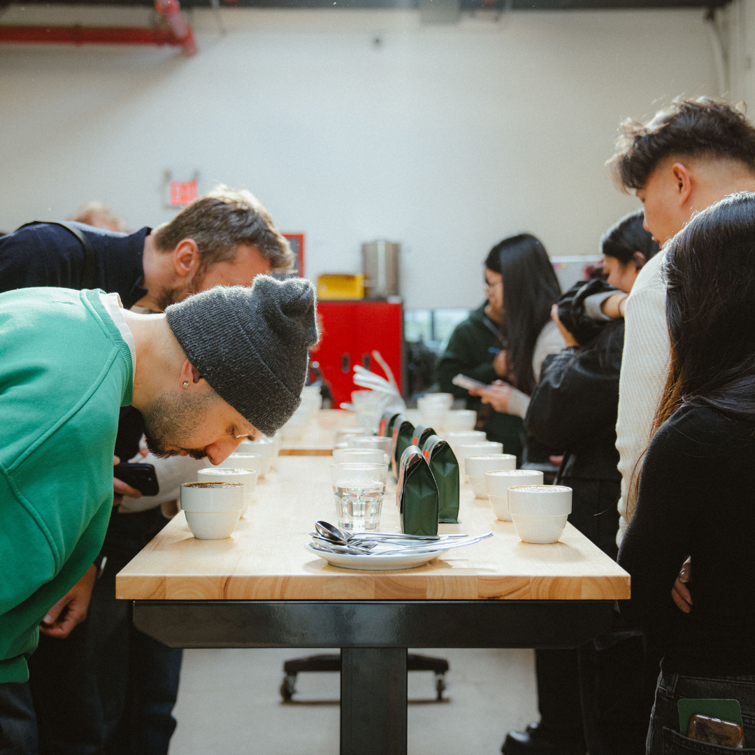 group of people at a coffee cupping
