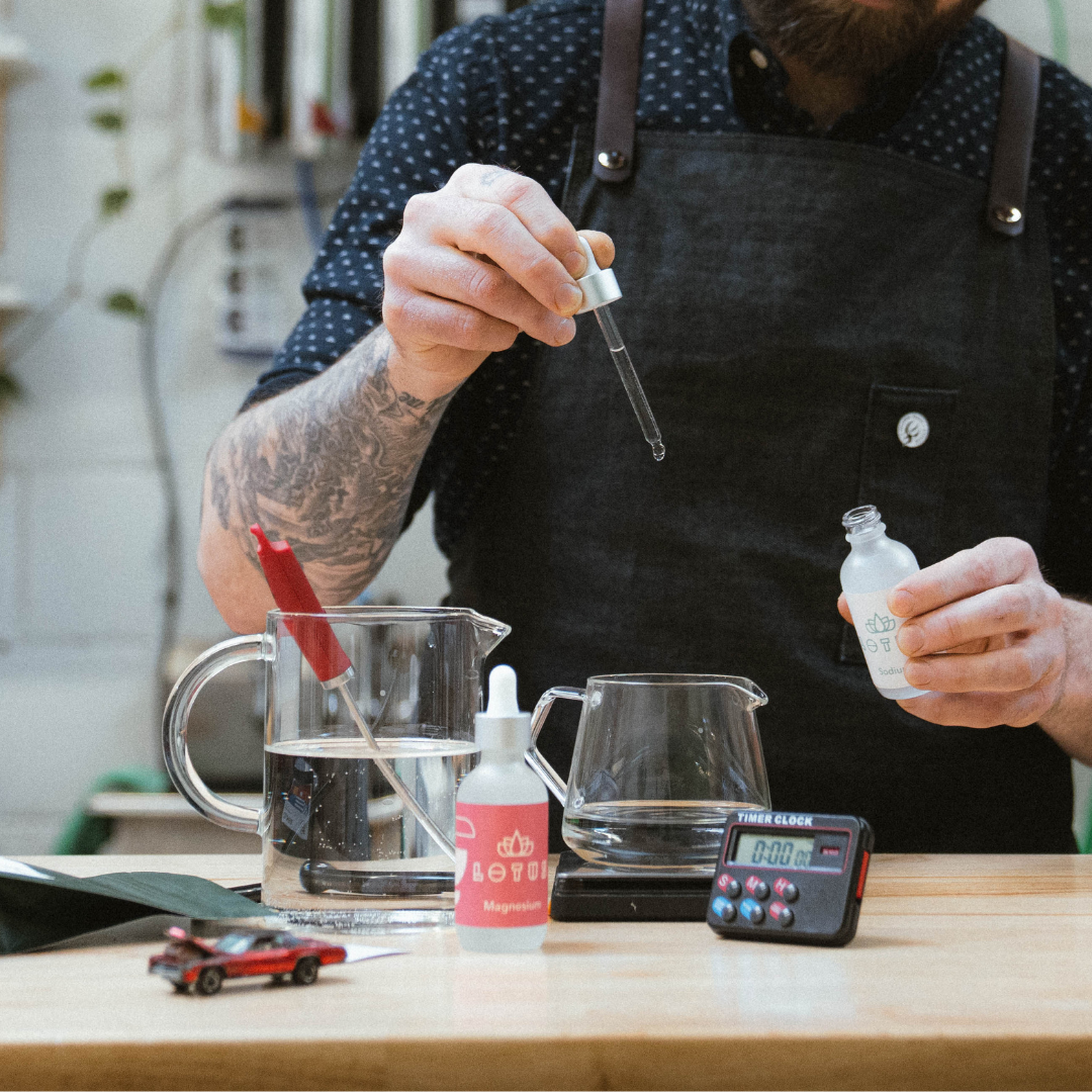 man testing the mineral content of water