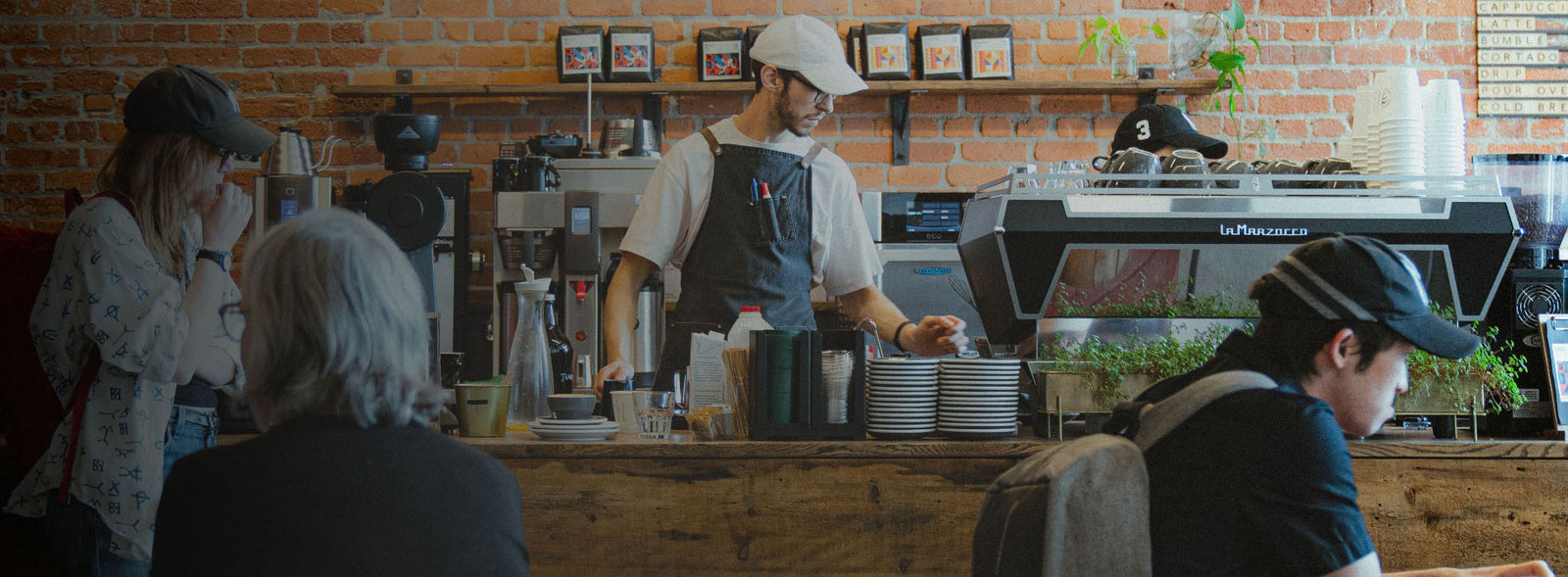 barista at a specialty coffee shop cafe